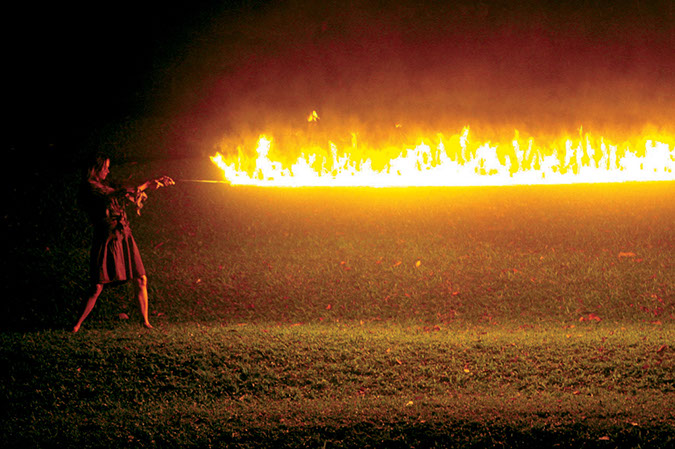 performer with fire rope in Brink at Tanks Arts Centre 2005